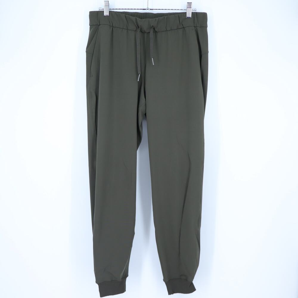 Lululemon On the Fly Jogger Dark Olive Luxtreme Mid Rise Drawstring Women's 8
